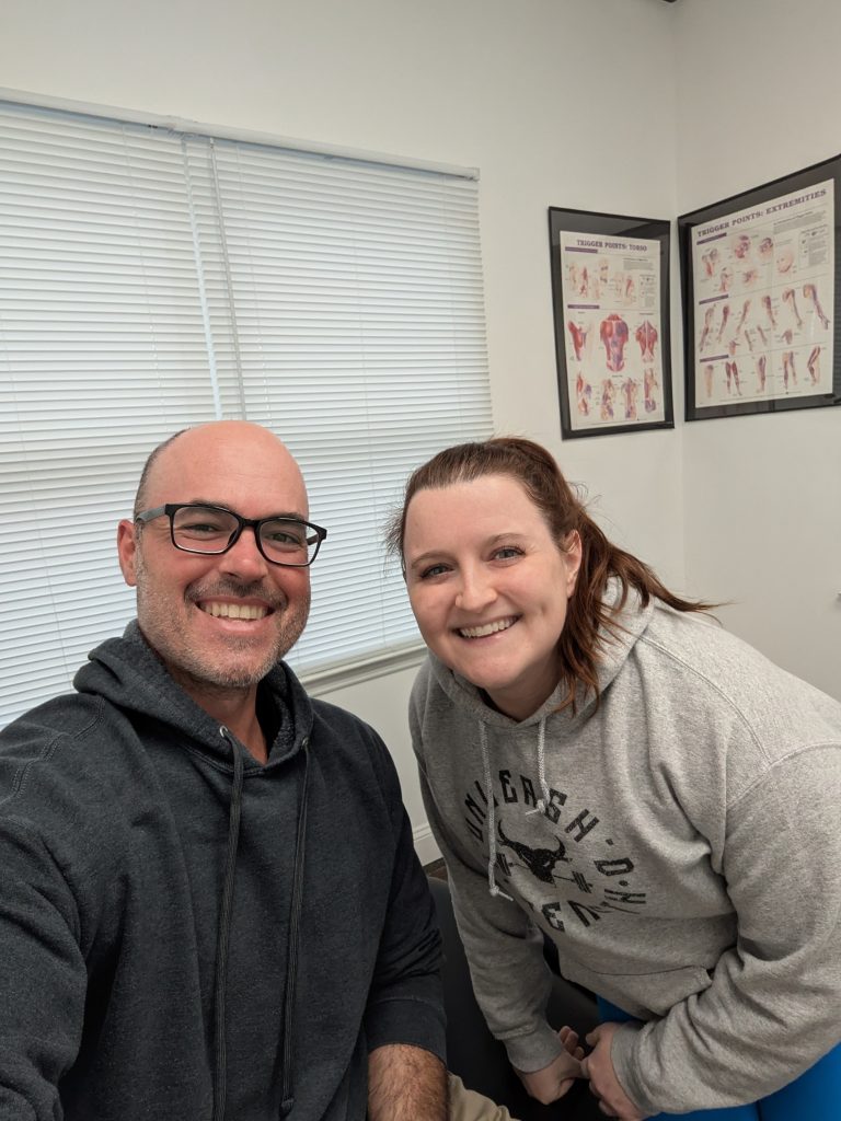 Dr. David Glazer, Chiropractor with a Patient