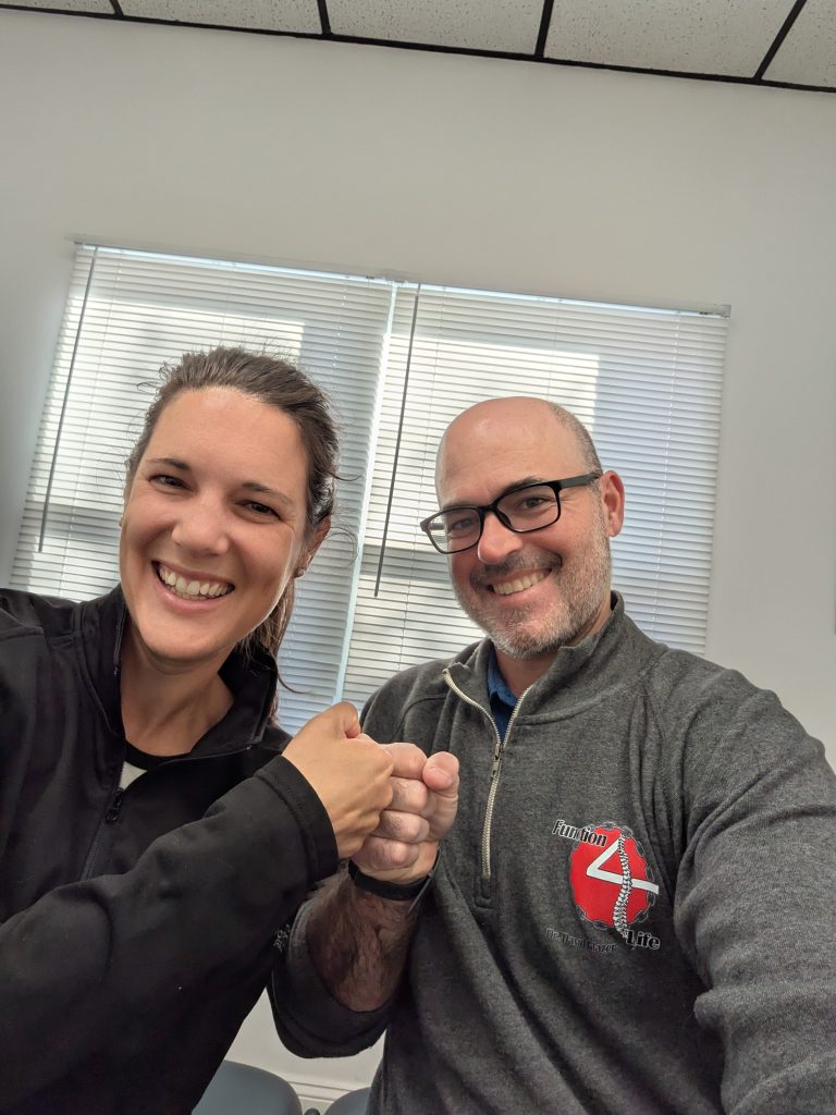 Dr. David Glazer, Chiropractor with a Patient