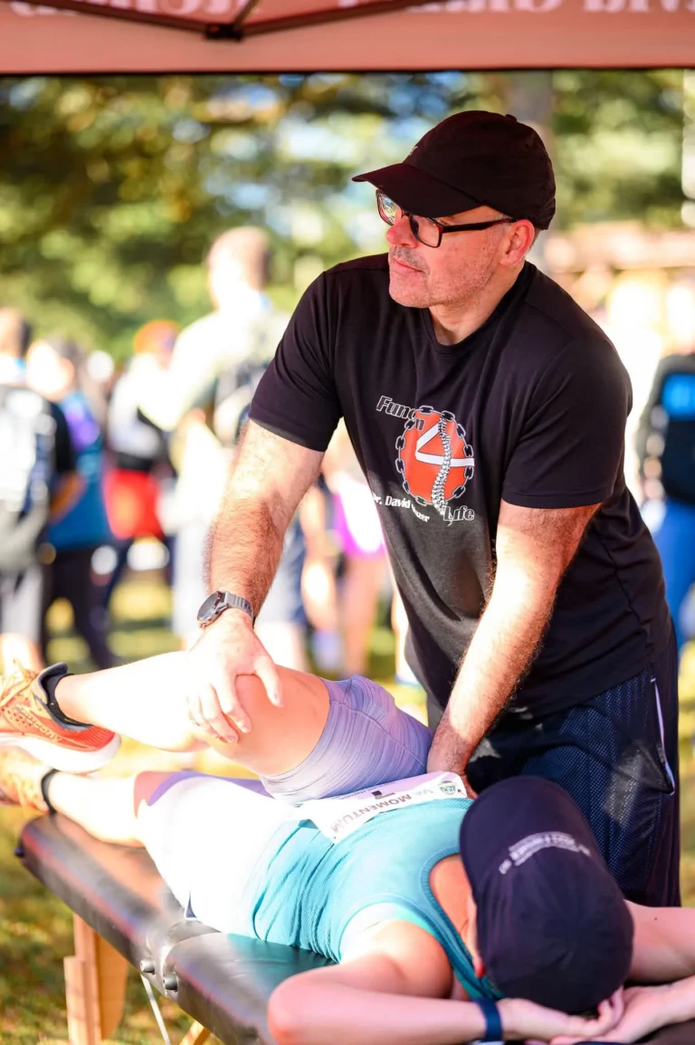Dr. David Glazer providing hands-on movement care to a patient at Function 4 Life in Harrisonburg