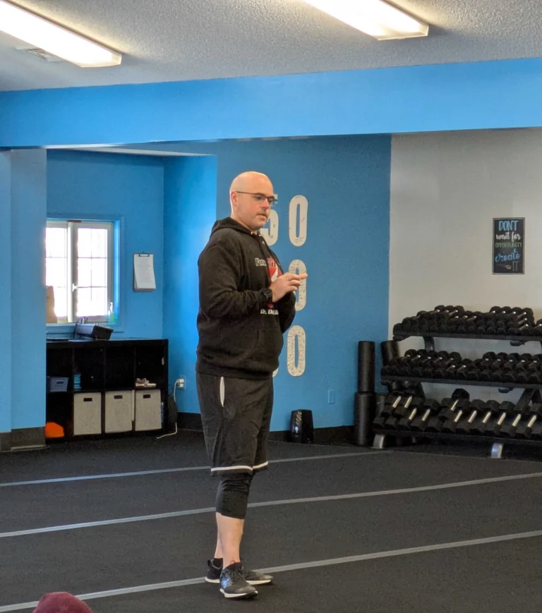 Dr. David Glazer demonstrating functional movement exercises at Function 4 Life in Harrisonburg